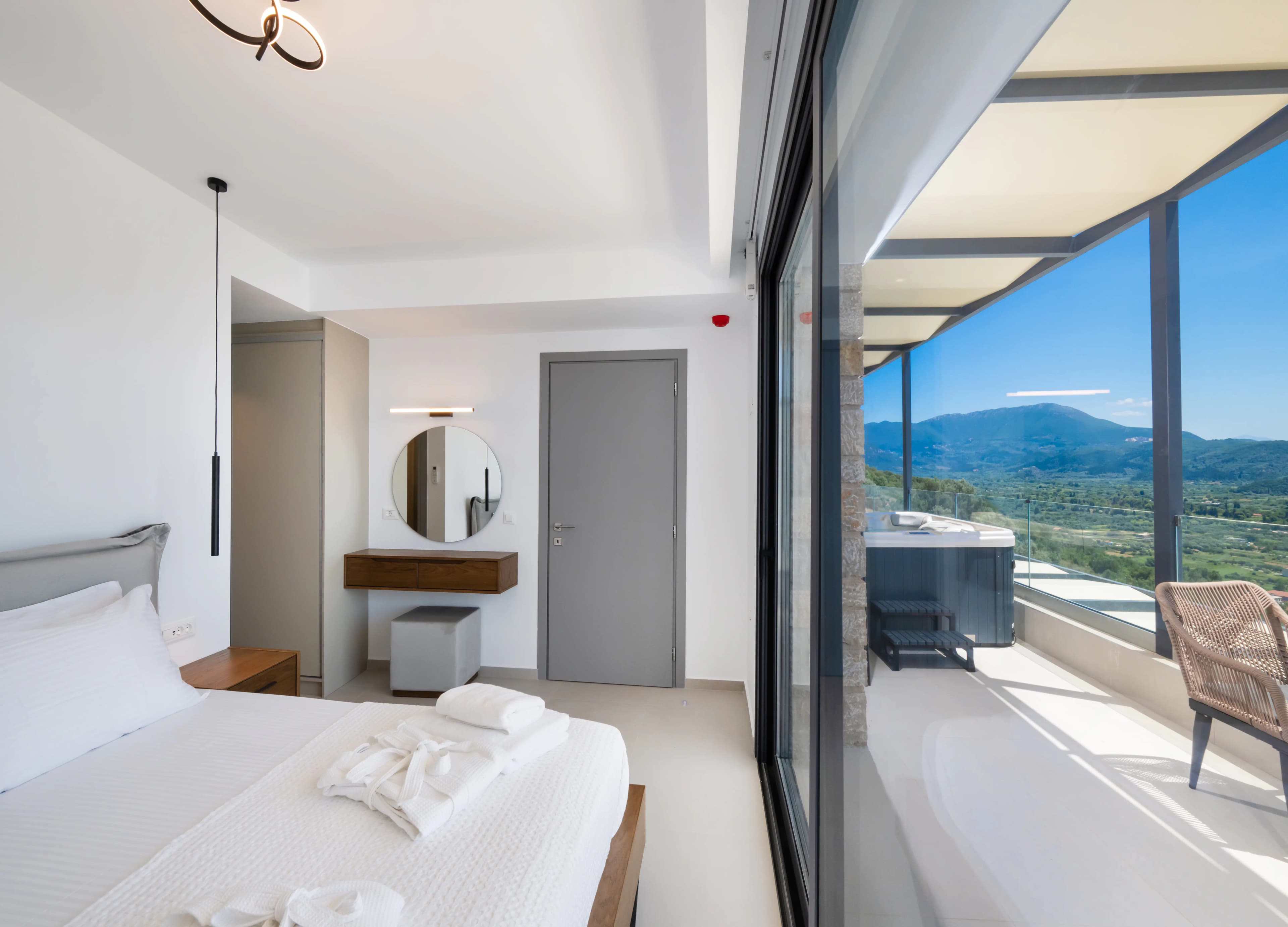 Pool area at sunset at Azzura Villas